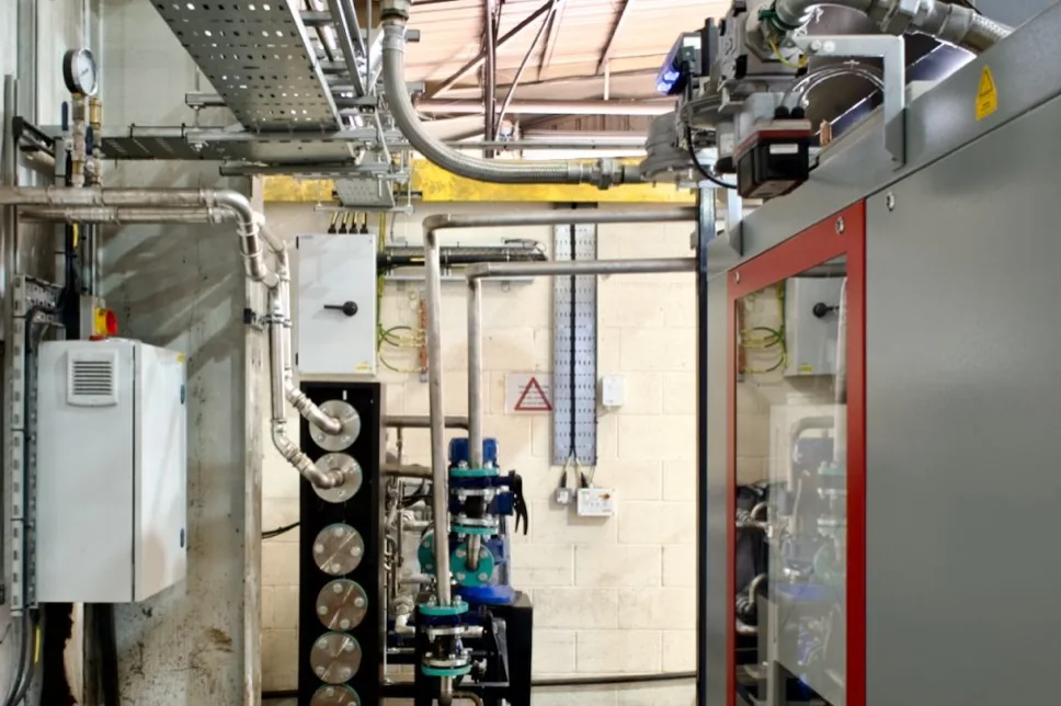 Near-silent V12 gas engine CHP plant room powering a precision engineering site near Chesterfield
