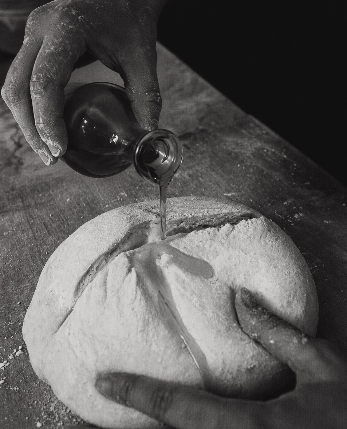 Olive oil poured over bread